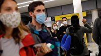 French to wear masks in workplaces as other countries tighten curbs